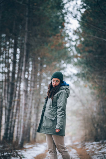 istock Woman Hiking In The Forest 1302319415