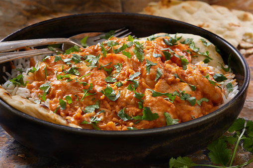 Spicy Indian Butter Chicken with Shrimp,Rice, Naan Bread and Fresh Cilantro