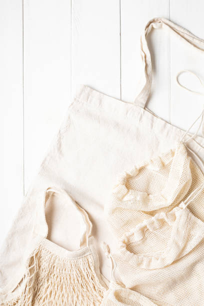 istock Eco-friendly cotton group bags lie 1302328163