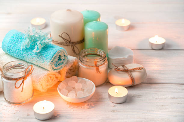 istock Atmospheric spa composition with burning candles. Cleaning kit 1302329198