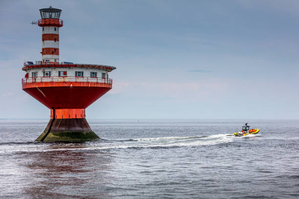 Haut-Fond Prince Light Tower or Prince Shoal Lighthouse, in the Saint-Lawrence, named La Toupie, Spinning Top in English but, Tadoussac locals call it The Top. Travel photography. cote nord photos stock pictures, royalty-free photos & images