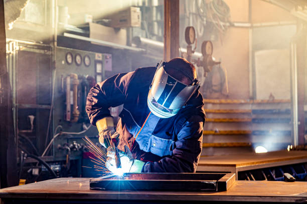 istock A welder welding in factory 1302329826