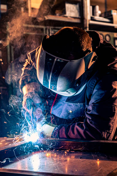 istock Close up of a welder welding 1302329889