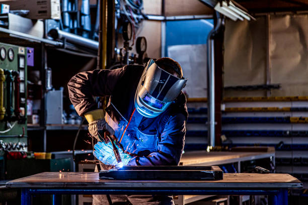 istock A welder welding in factory 1302329892