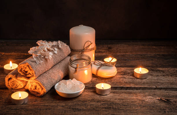 istock Beautiful, atmospheric Spa composition with the light of candles 1302329947