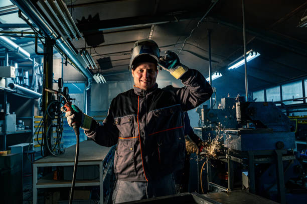 istock Portrait of a welder posing in a workshop 1302330485