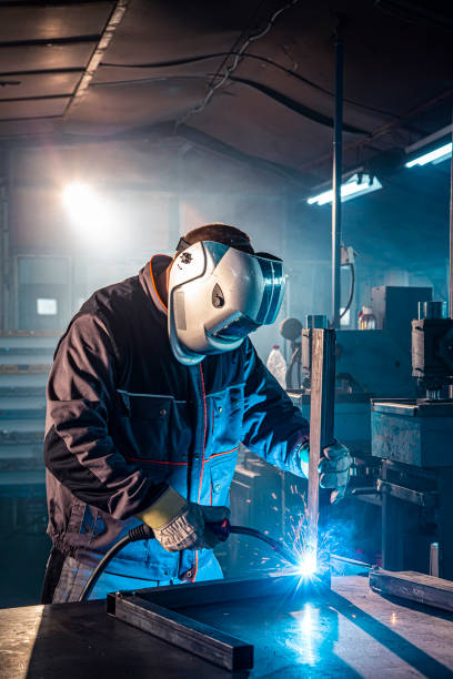 istock A welder welding in factory 1302330639