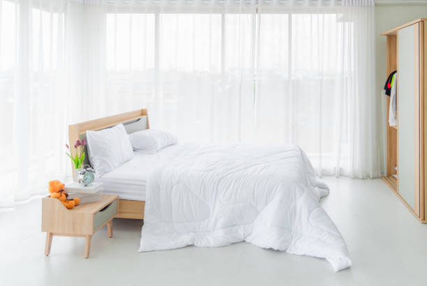 Modern white bedroom bright and spacious