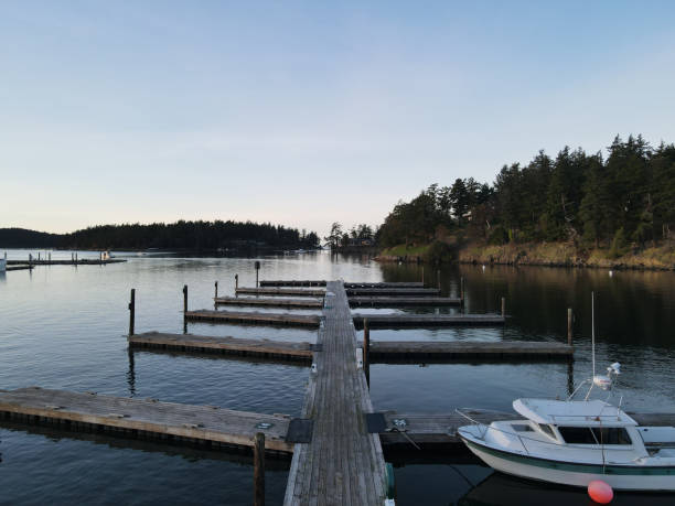 istock Sunset with boats in a harbor 1302333455