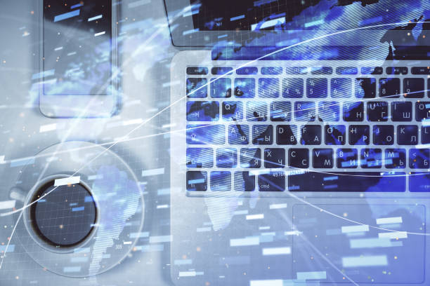 istock Multi exposure of data theme drawing hologram over topview work desk background with computer. Concept of technology. 1302336992