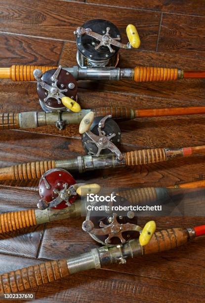 Vintage Bamboo Fishing Rods And Conventional Reels Stock Photo