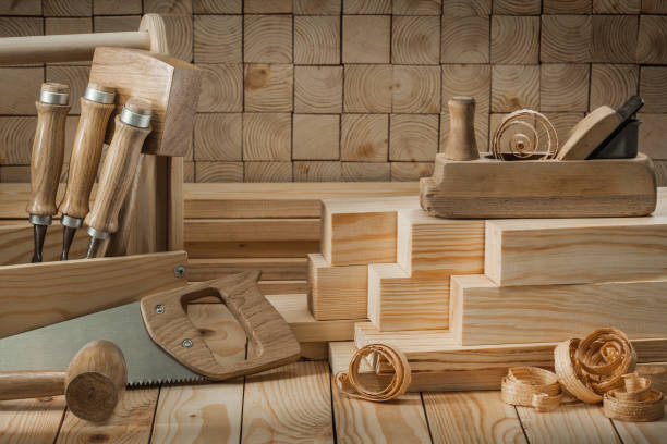 istock carpentry tools on wooden background handsaw mallets chissels woodworking plane with timber 1302337783