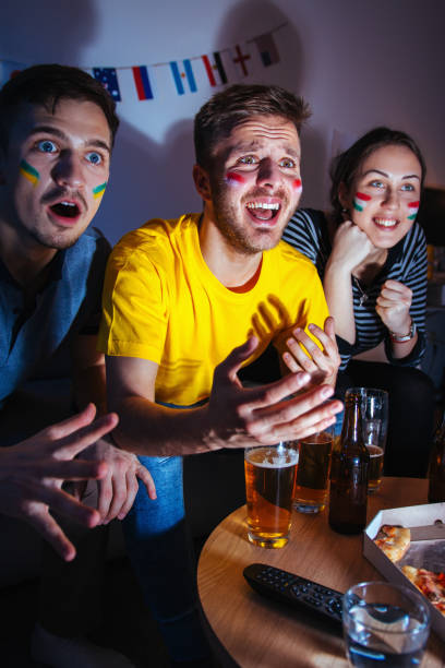 Sport fans watching a game together