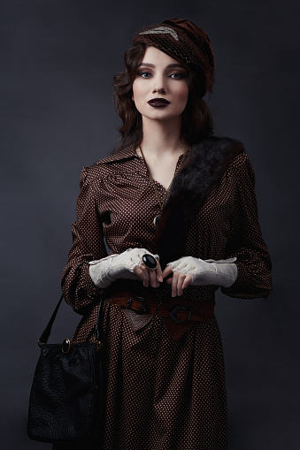 Woman in retro style of 1920s years.