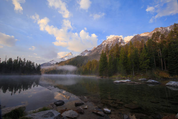 istock The Grand Tetons reflecting off String Lake 1302349036