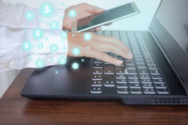 istock Staff woman typing keyboard computer laptop and holding smartphone 1302349841