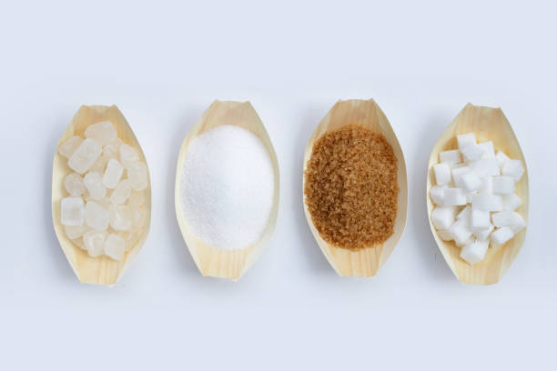 istock Various types of sugar on white background. 1302350889