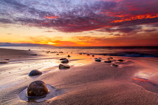 istock Sunset Ocean Colorful Sky 1302356756