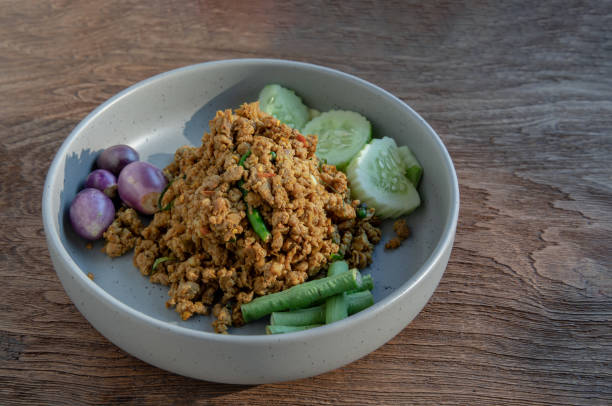 istock Southern Stir-Fried Pork with Yellow Curry Paste. 1302357528