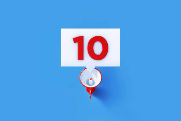 istock Red Megaphone Forming Number Ten on Blue Background 1302358273