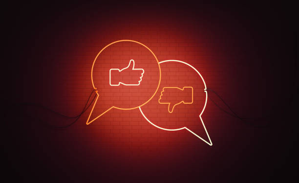 white and red neon speech bubble pair thumbs up and thumbs down arrow symbols sitting over black wall - thumbs up human thumb human hand conflict imagens e fotografias de stock