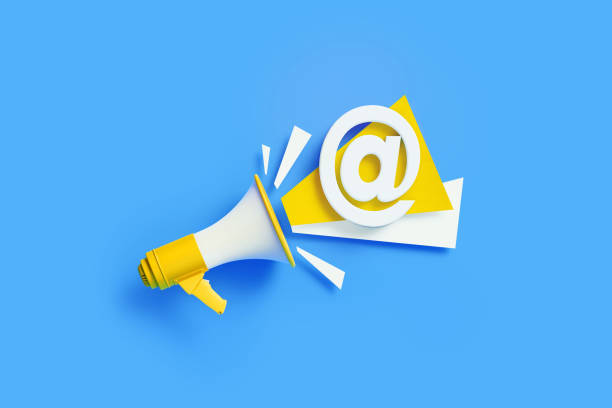istock At Symbol Coming Out From Yellow Megaphone On Blue Background 1302359353