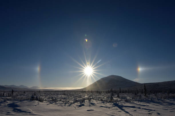 Alaska winter sun halo stock photo
