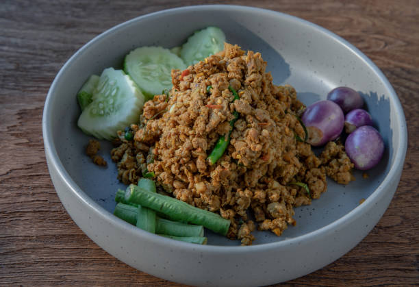istock Southern Stir-Fried Pork with Yellow Curry Paste. 1302363089