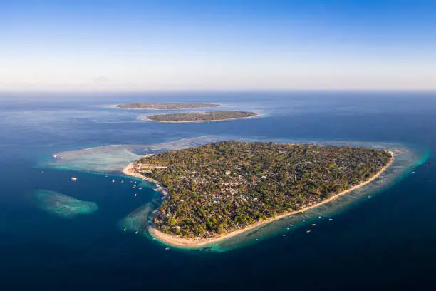 Aerial view of the three Gili island, Meno, Air and Trawangan off the coast of Lombok in Indonesia