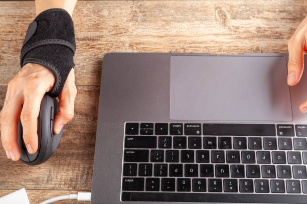 Wrist Over Computer 80+ Carpal Tunnel Syndrome Brace Computer Wrist Stock Photos, Pictures ...