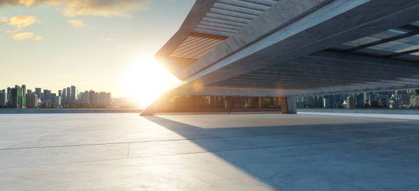 istock Concrete floor and modern building exterior 1302368525
