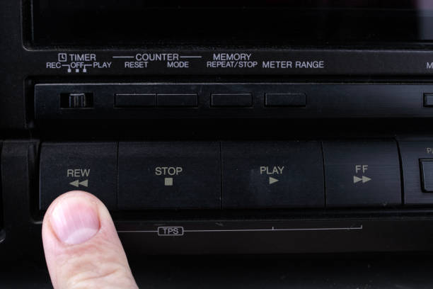 istock Press Rew button on retro audio cassette tape recorder. 1302373917