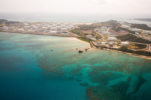 View from the air looking down at Henza island with its many petroleum and oil tanks.