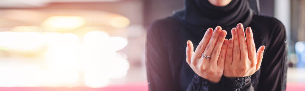 istock close up hand of making wish praying blessing god. copy space. 1302378374