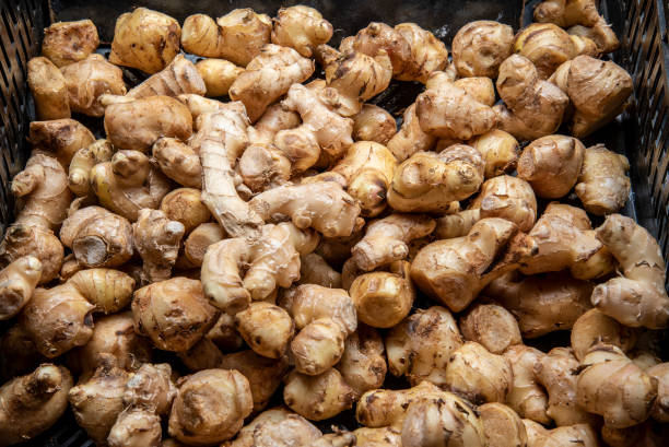 raw ginger on a market stall