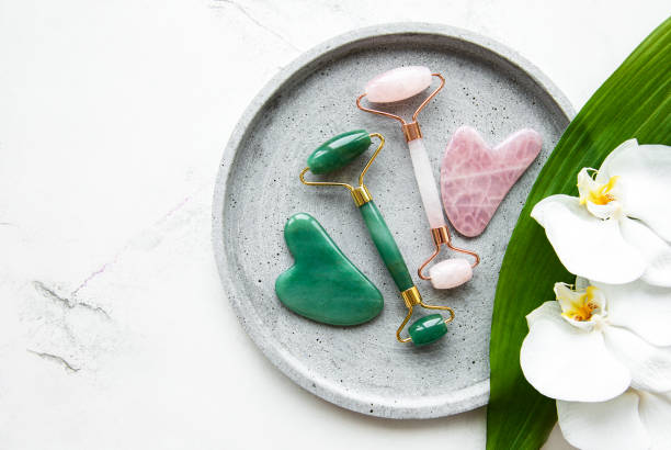 istock Jade face rollers for beauty facial massage therapy 1302382431