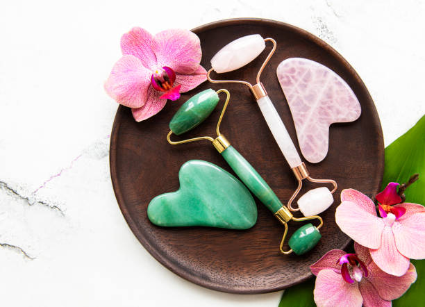 istock Jade face rollers for beauty facial massage therapy 1302382432