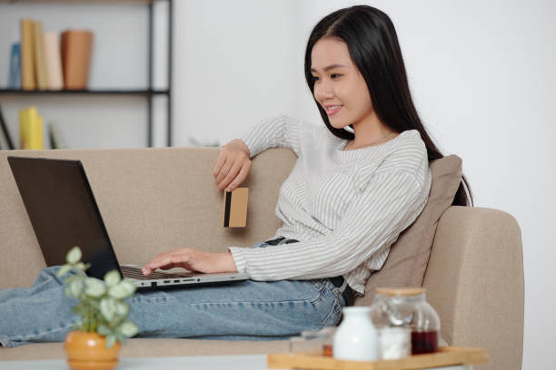 istock Young woman enjoying shopping 1302382690