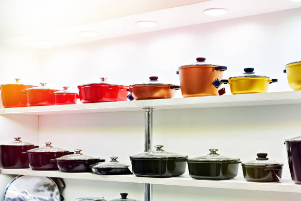 istock Enameled kitchen stock pots in store 1302387588