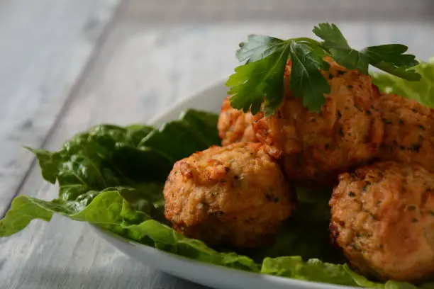 Fried fish meatballs with  parsley