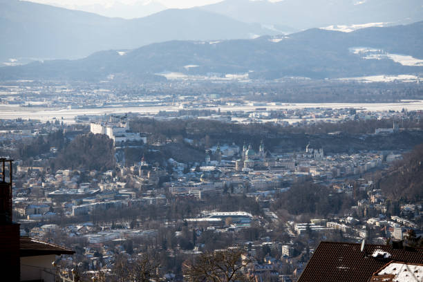 Outlook over Salzburg from Gaisberg, winter time Historic district of Salzburg, view from Gaisberg, Winter time gaisberg stock pictures, royalty-free photos & images