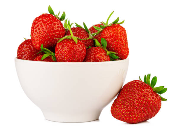 istock bowl with strawberries isolated on white background 1302395037