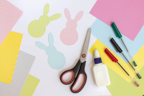istock DIY Easter. Easter bunny made of paper. Easter bunny craft paper. 1302399933
