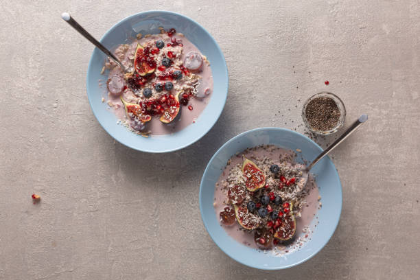 istock Healthy breakfast with oatmeal and fruit, top view 1302401861