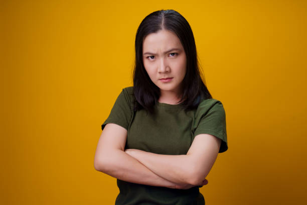 istock Asian woman standing and angry. 1302402130