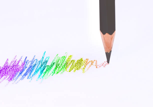 a gray pencil draws a rainbow line