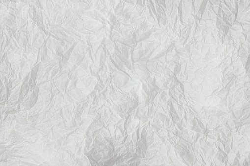 Baking paper sheet isolated on white background, top view. Parchment for baking culinary.