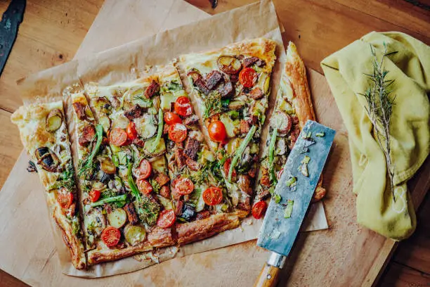 Photo of Homemade Tarte Flambée in style of a White Pizza