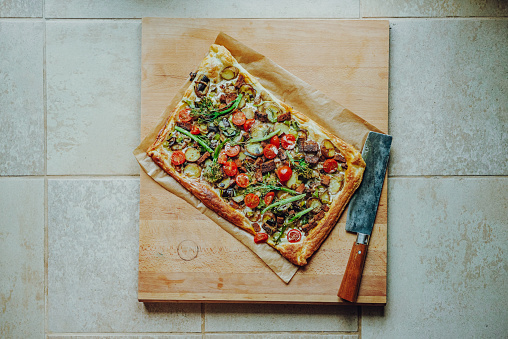 Homemade Tarte Flambée with Broccoli, Potato, Tomato and Tofu – vegan food, white pizza style