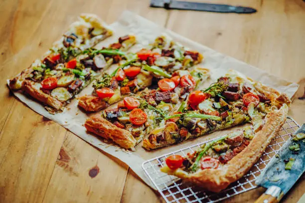 Photo of Homemade Tarte Flambée in style of a White Pizza